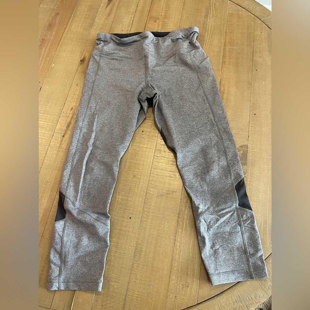 Lululemon crop legging below knee. Size 6. Grey and grey mesh.